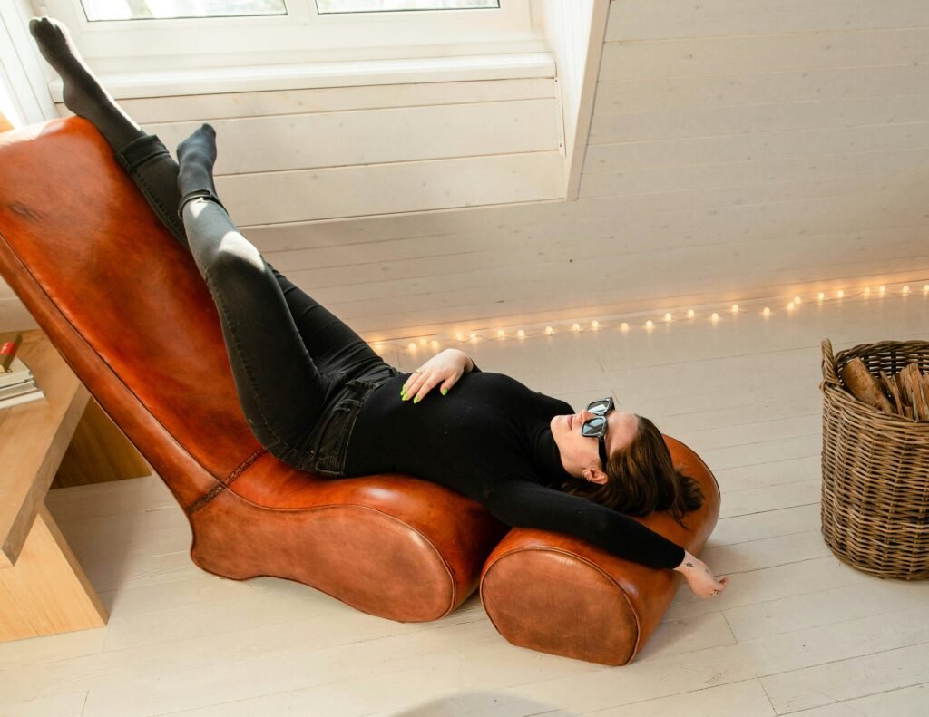 relaxed woman, putting her feet up, legs up and head down